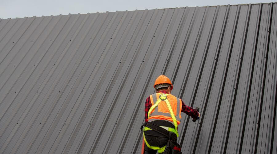 Professional metal roof installation services in Maple Rapids, MI